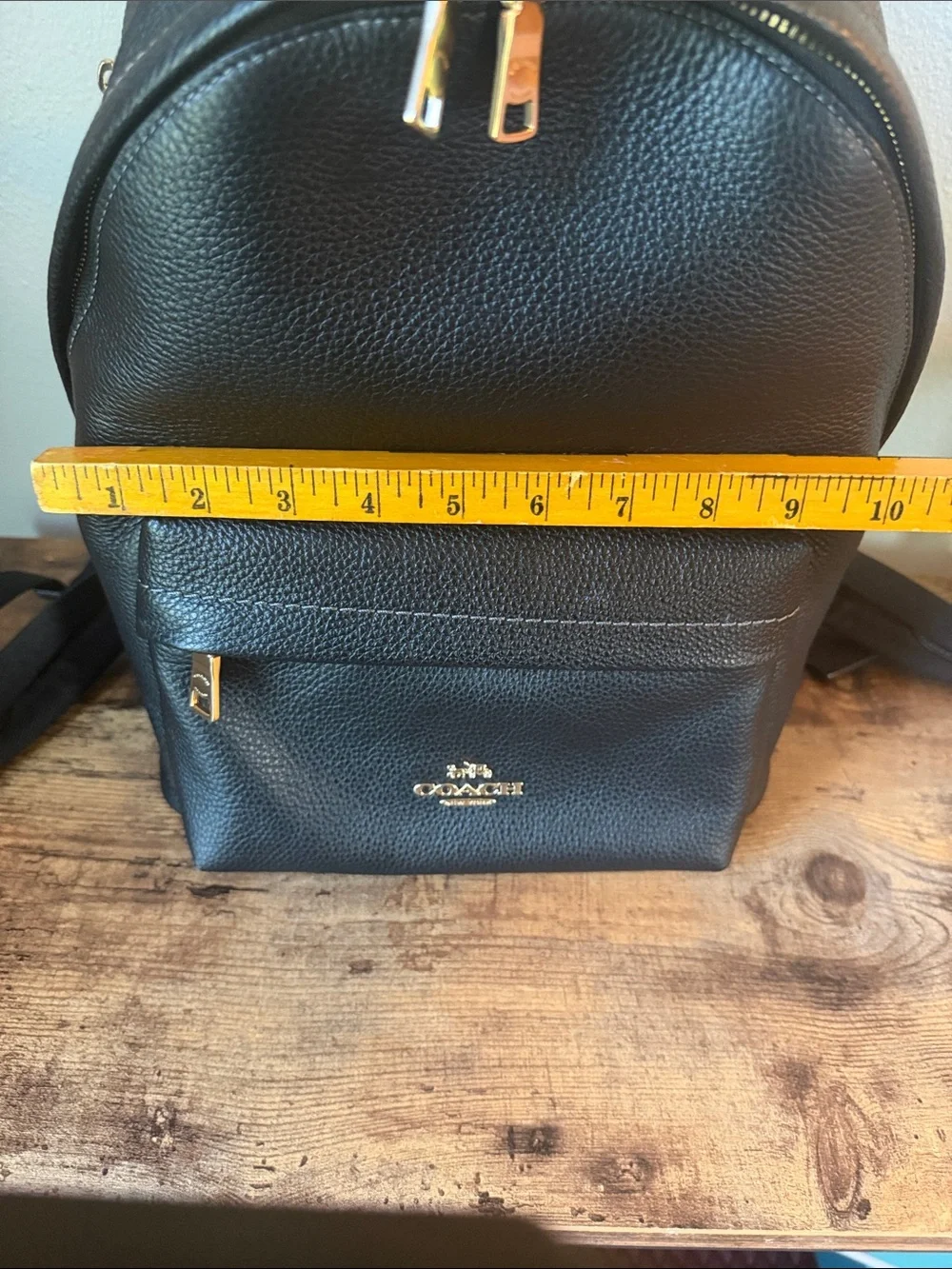 Coach Black Pebbled Leather Backpack with Gold-Tone Accents
